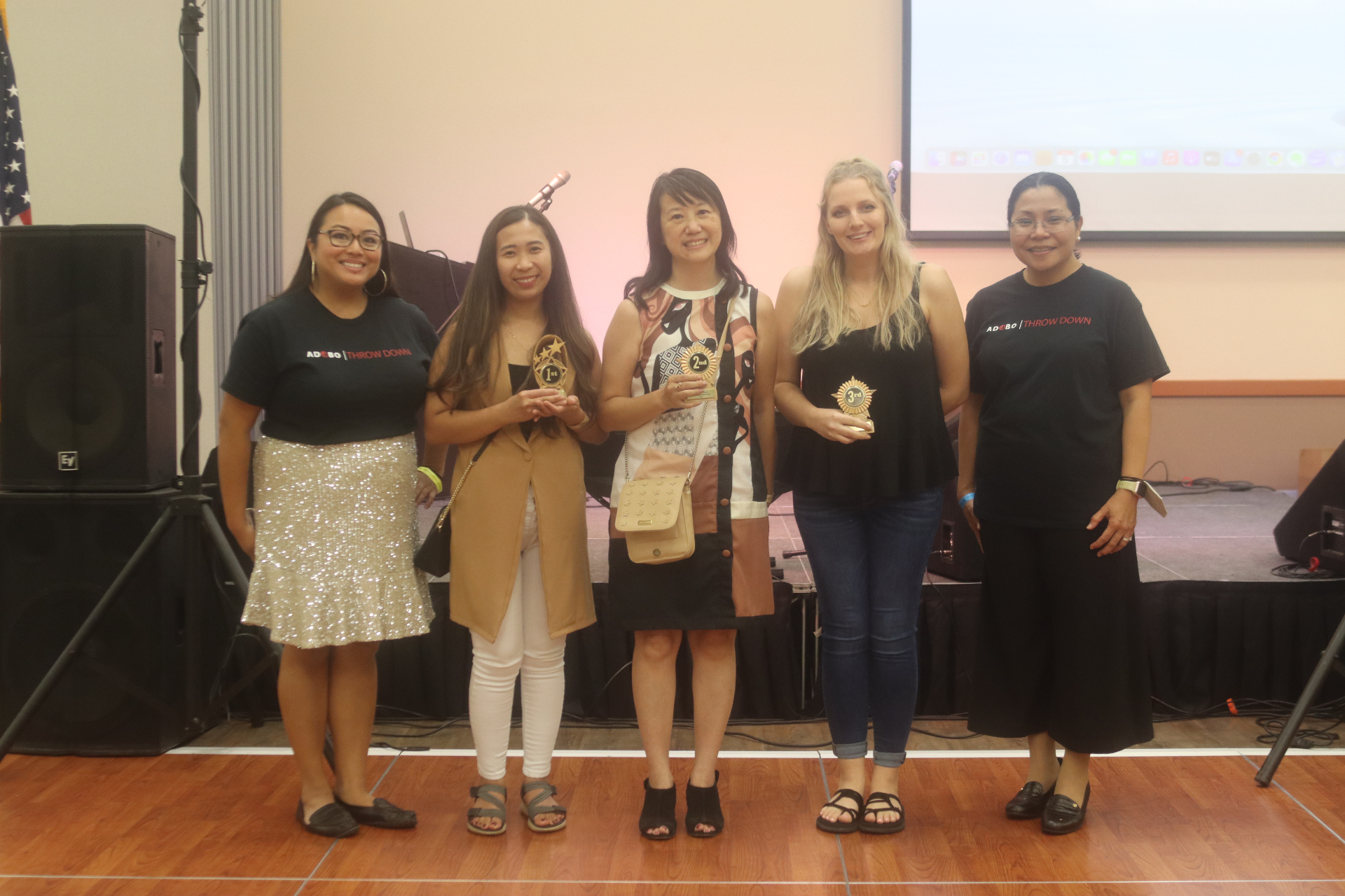 Group photo of Ube Throwdown winners and judges holding trophies.